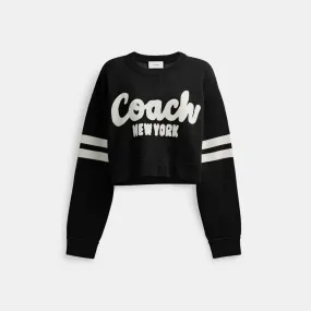 CROPPED COACH SWEATER